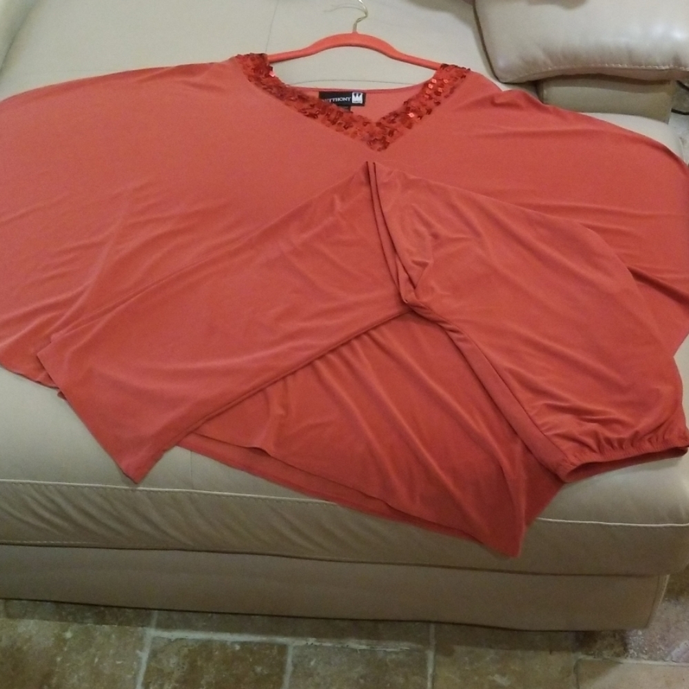 Cape suit with sequins